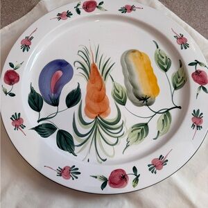 Hand-painted Italian ceramic oval serving platter with vegetables and flowers.